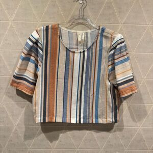 Eve Gravel for Anthropologie cropped, striped, linen top.